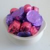 Bowl of multi colored chocolates